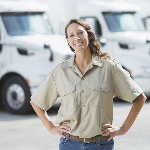 Fleet manager in front of vehicles